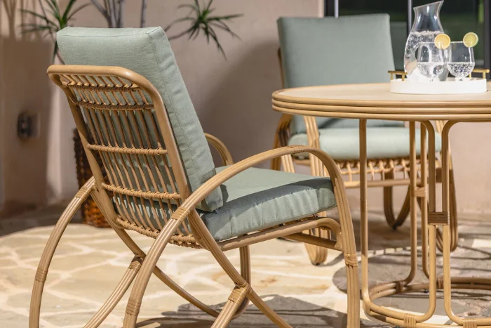 48-inch round table with armchair dining set, riviera collection, by lloyd flanders